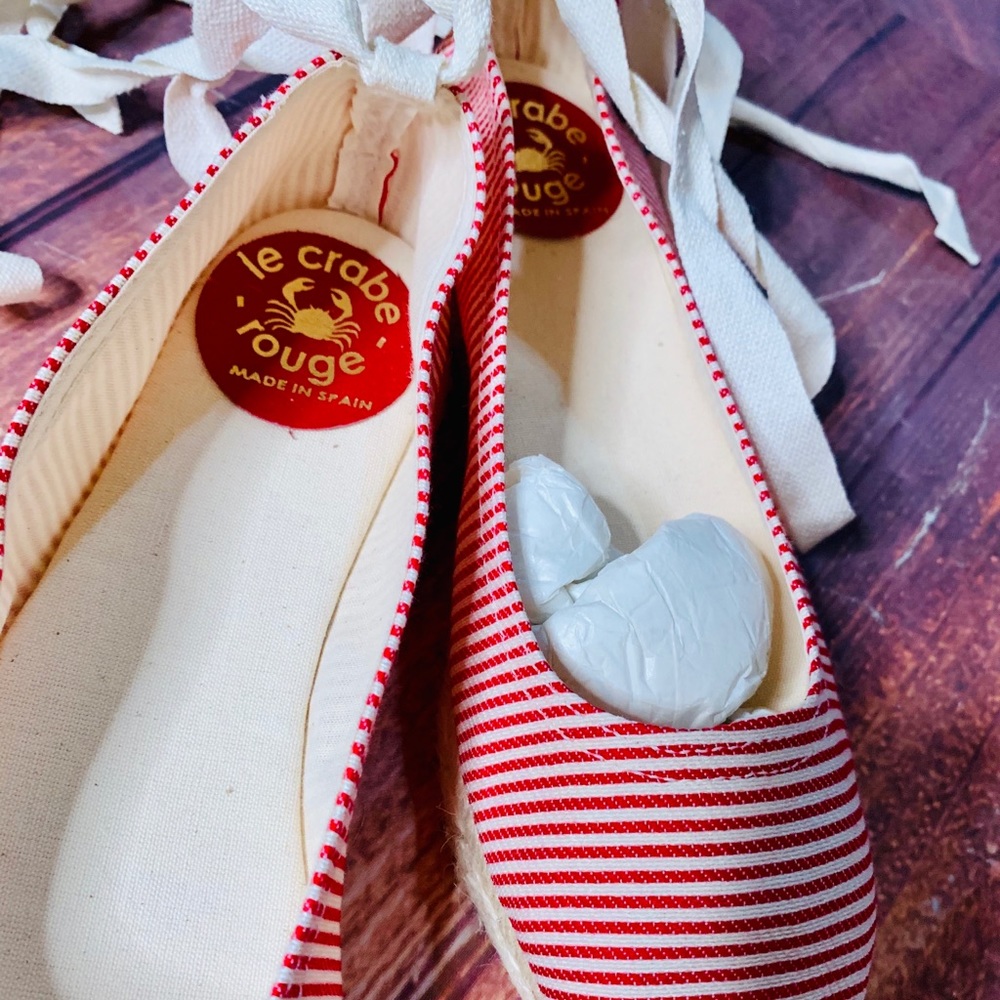 Brand new. Coral Wrap up espadrilles in size 8.